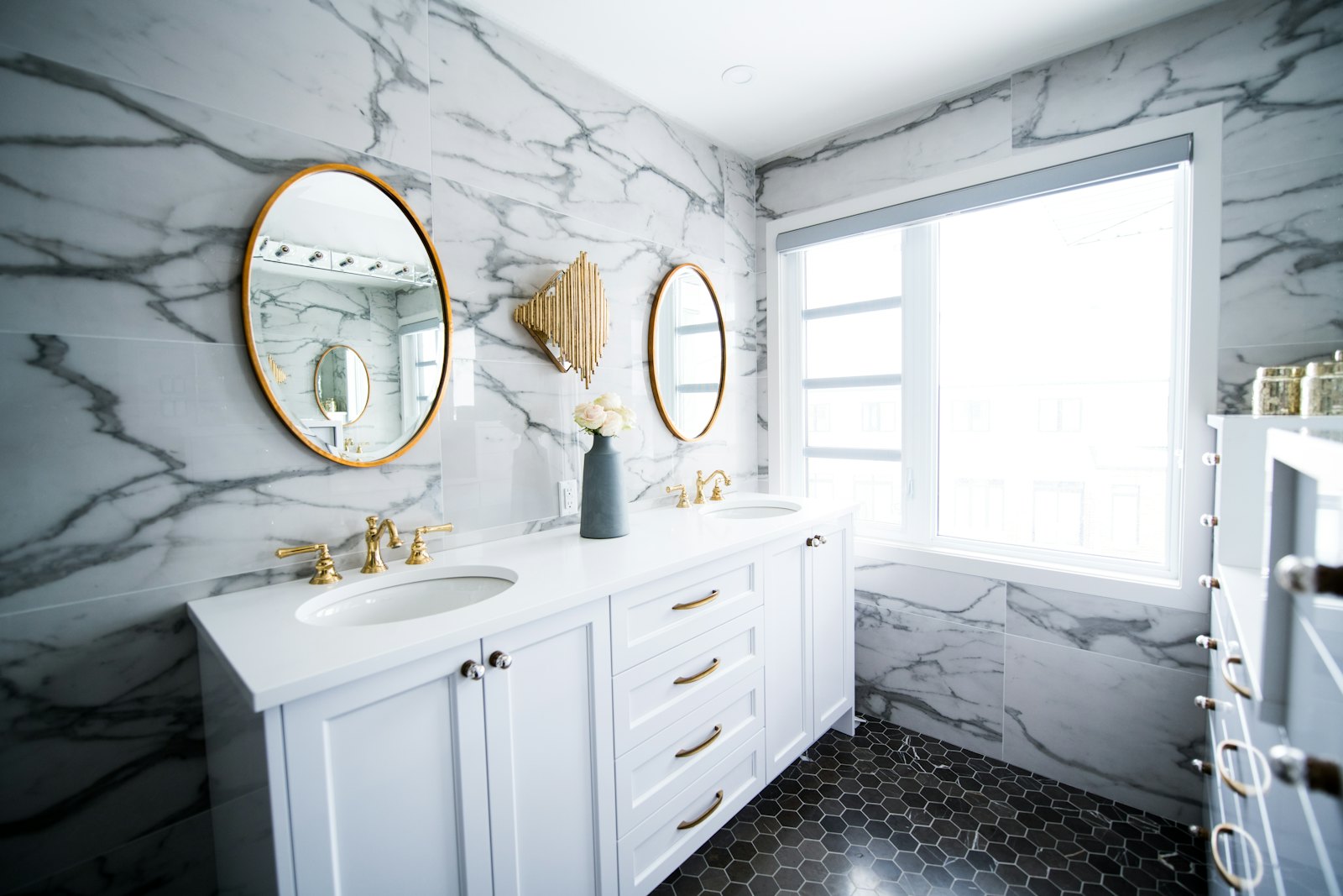 Marble bathroom with twin mirrors